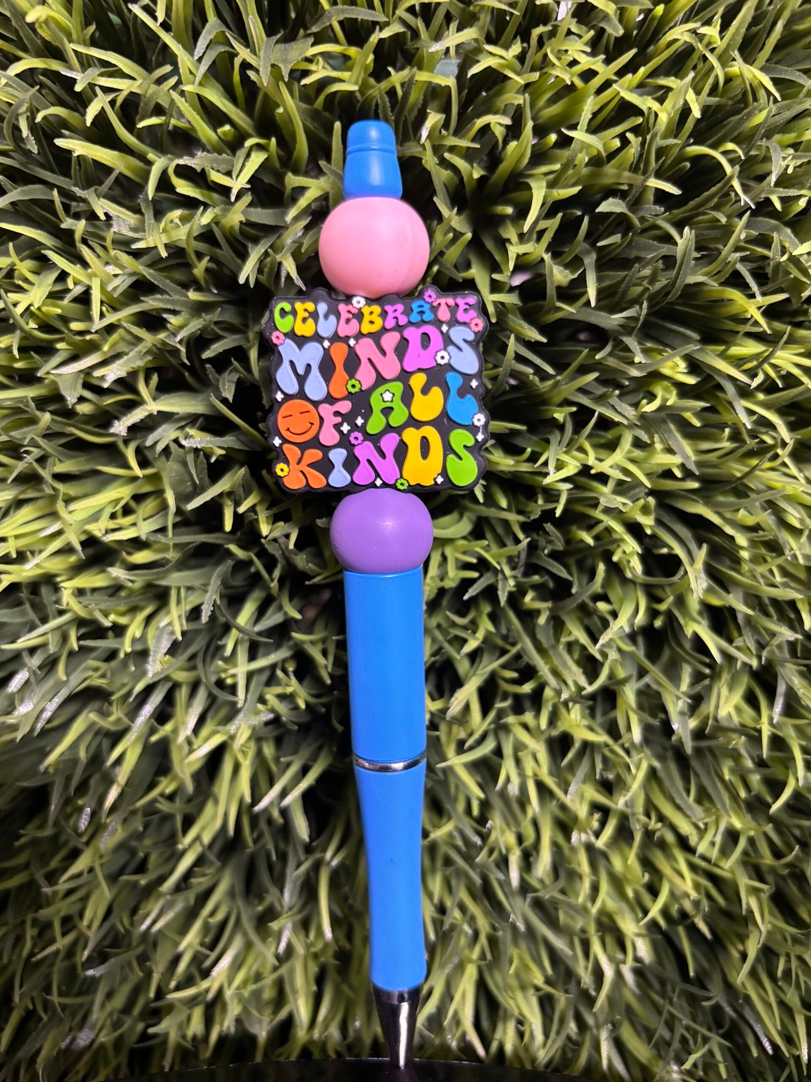 Blue celebrate minds of all kinds pen